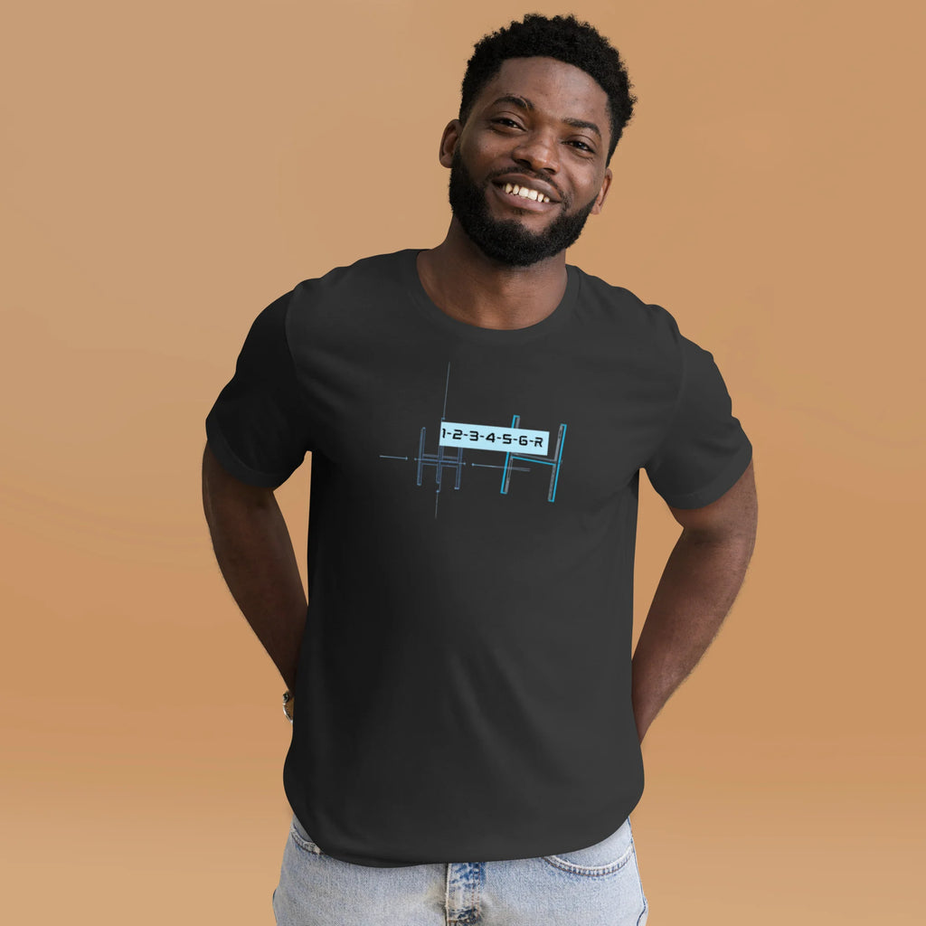 Smiling male model wearing a dark grey 6-speed manual transmission blueprint stick shift car enthusiast graphic t-shirt