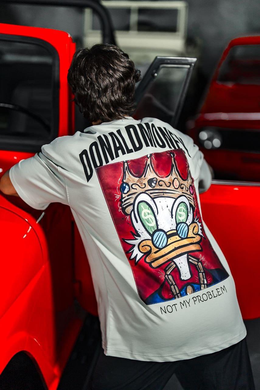 Donald Money Duck Graphic Tee, Funny Cartoon T-Shirt, Dollar Sunglasses.
