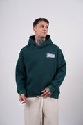 Purple Medallion Tile Art Oversized Hoodie in Green - front view
