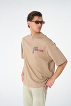 Oversize Cotton Tee / "AWARE" Dove Hands Symbolic Graphic Print