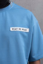 Oversize Cotton Tee - Layered Patch "What We Wear" Shirt