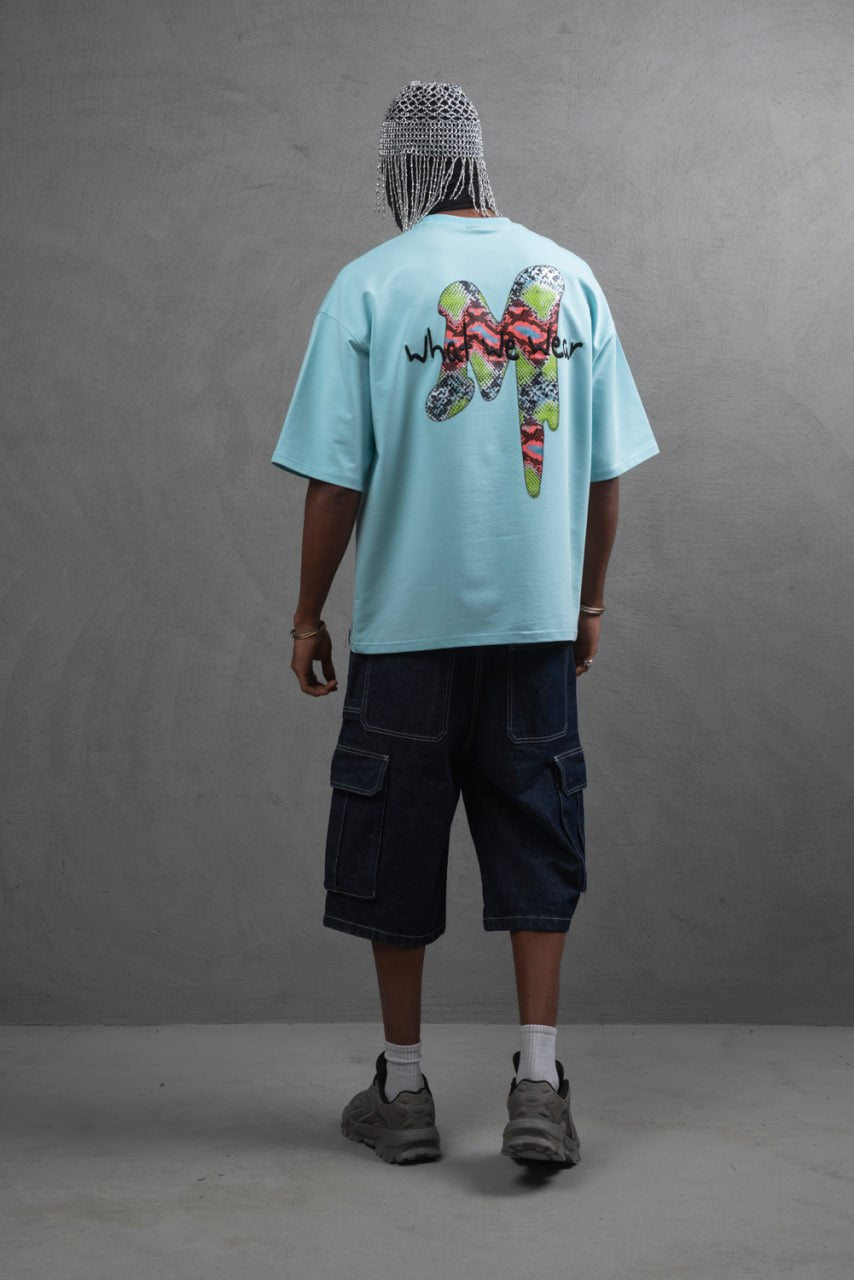 Oversize Graphic Cotton Tee – "What We Wear" Abstract Print
