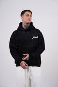 Sabr Arabic Calligraphy Oversized Hoodie in Black - front view
