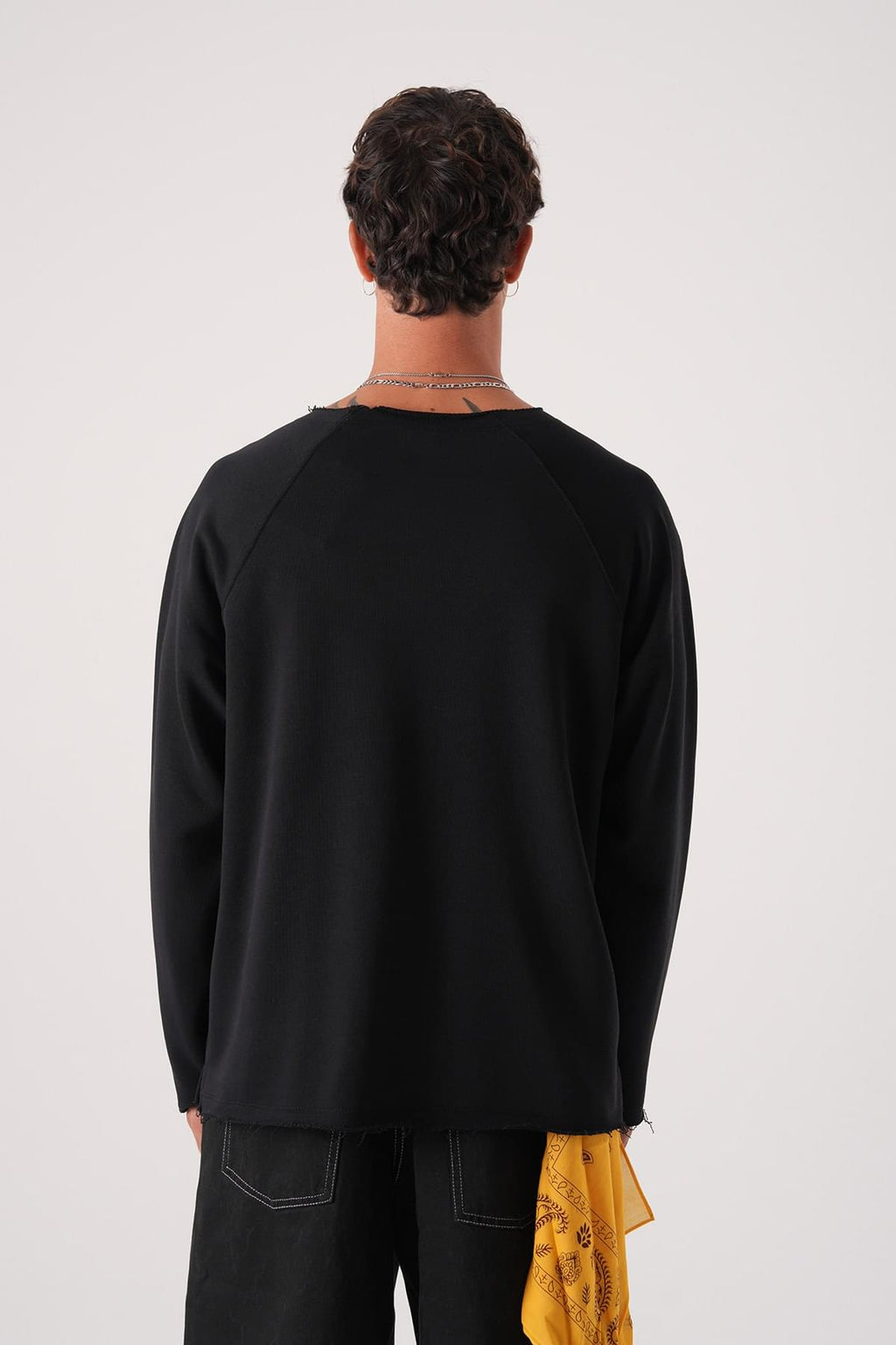Unisex Oversized Raglan Sweatshirt - Raw Hem Detail.