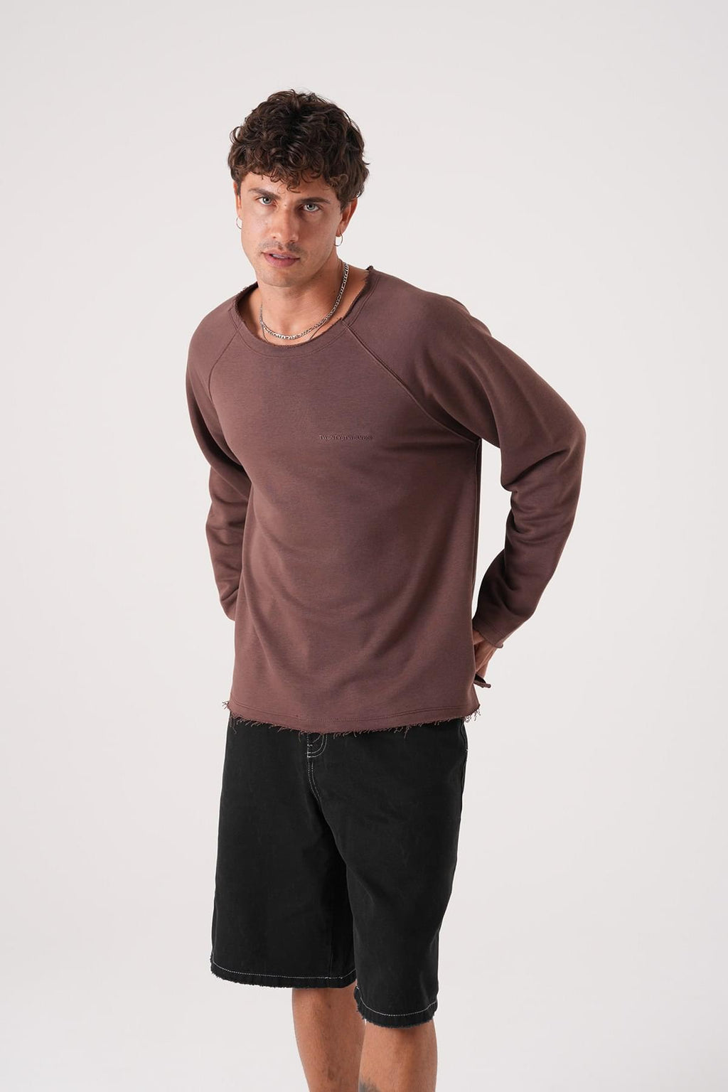 Unisex Oversized Raglan Sweatshirt - Raw Hem Detail.