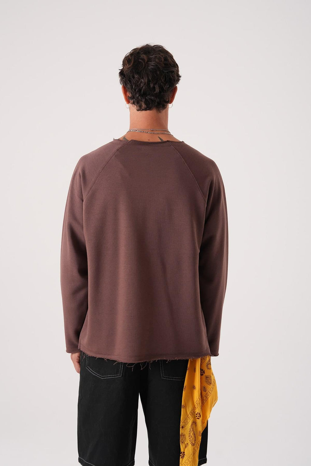 Unisex Oversized Raglan Sweatshirt - Raw Hem Detail.