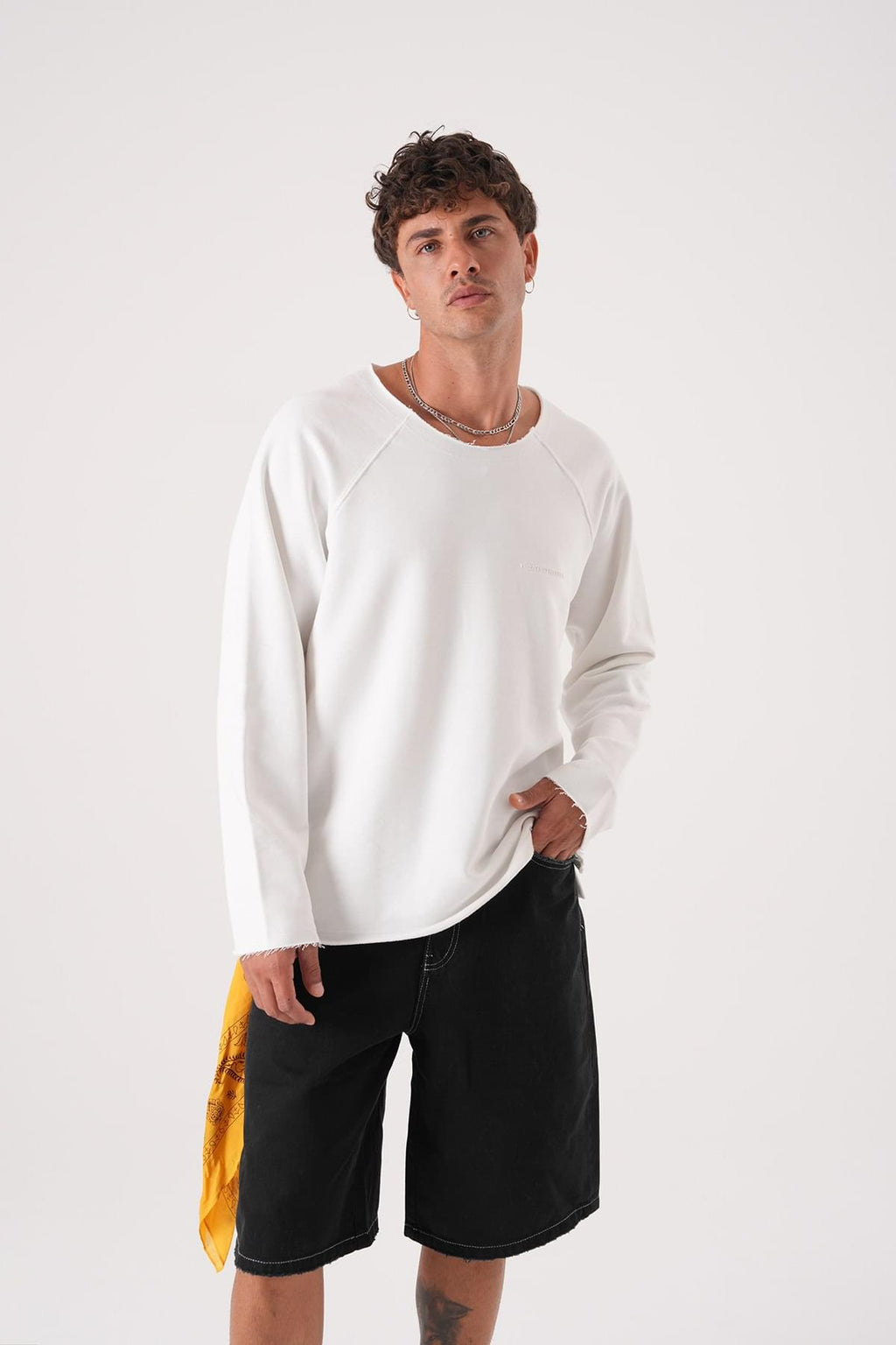 Unisex Oversized Raglan Sweatshirt - Raw Hem Detail.