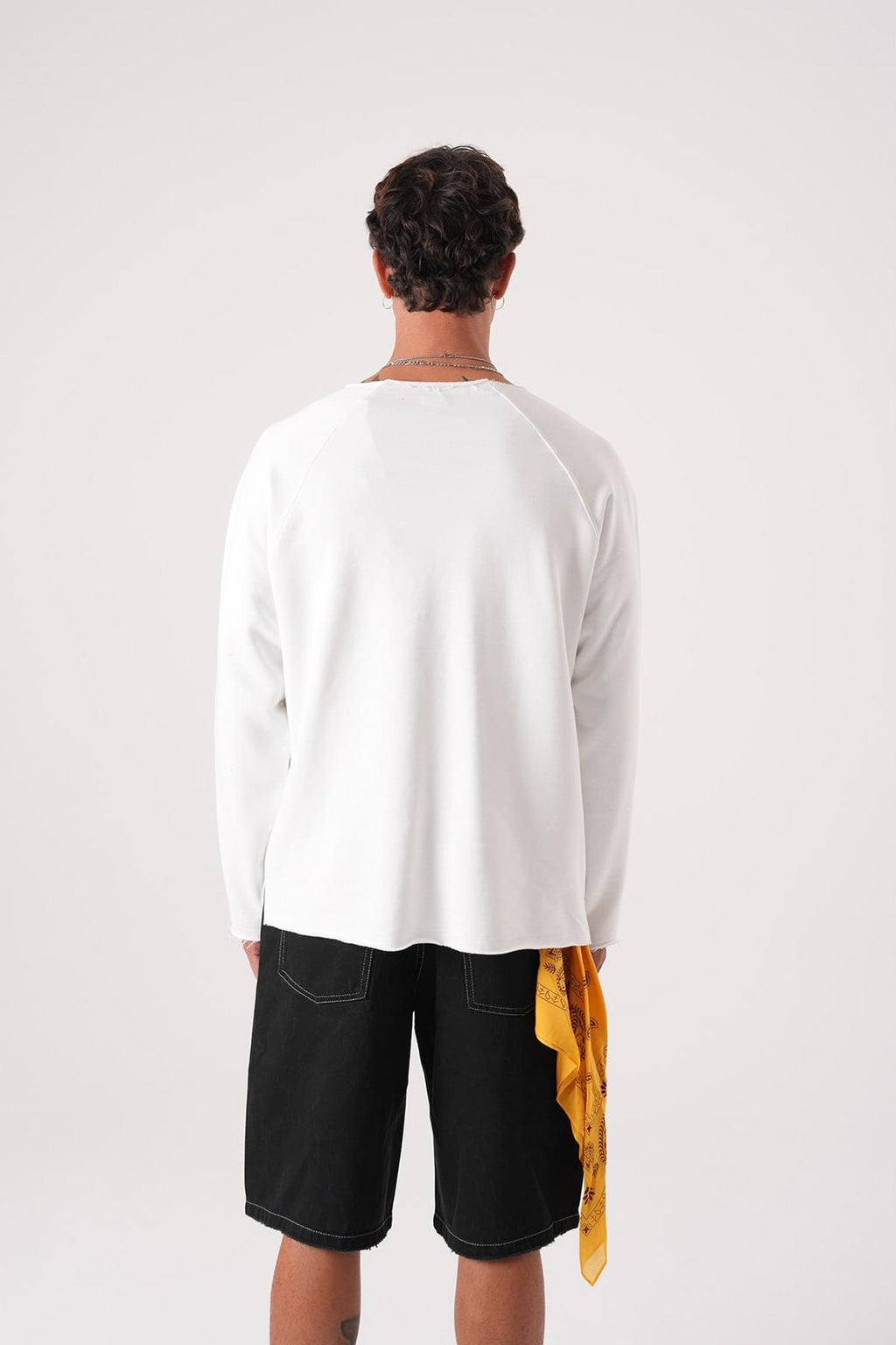 Unisex Oversized Raglan Sweatshirt - Raw Hem Detail.
