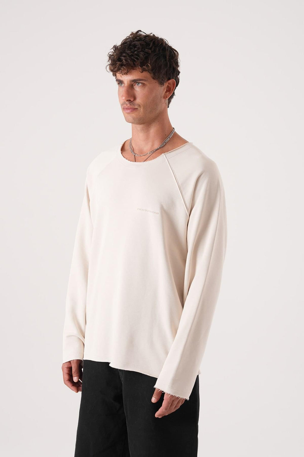 Unisex Oversized Raglan Sweatshirt - Raw Hem Detail.