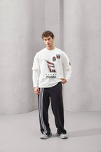 Y2K Layered Sleeve Graphic Tee – front view with bold retro prints by Withinblack