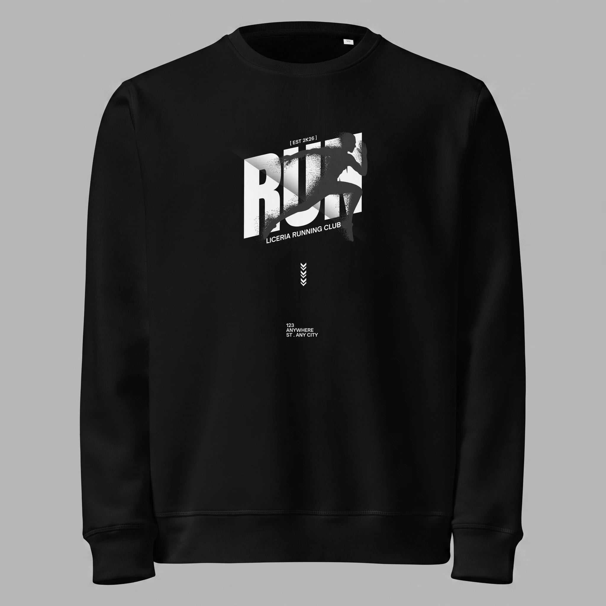 Front view of a black crewneck sweatshirt flat lay on a grey background. The sweatshirt features a white and grey graphic on the chest with bold typography spelling 'RUN', a dark silhouette of a sprinting athlete overlaying the text, and 'LICERIA RUNNING CLUB' printed below, along with subtle geometric details and small bottom text '123 ANYWHERE ST. ANY CITY'.