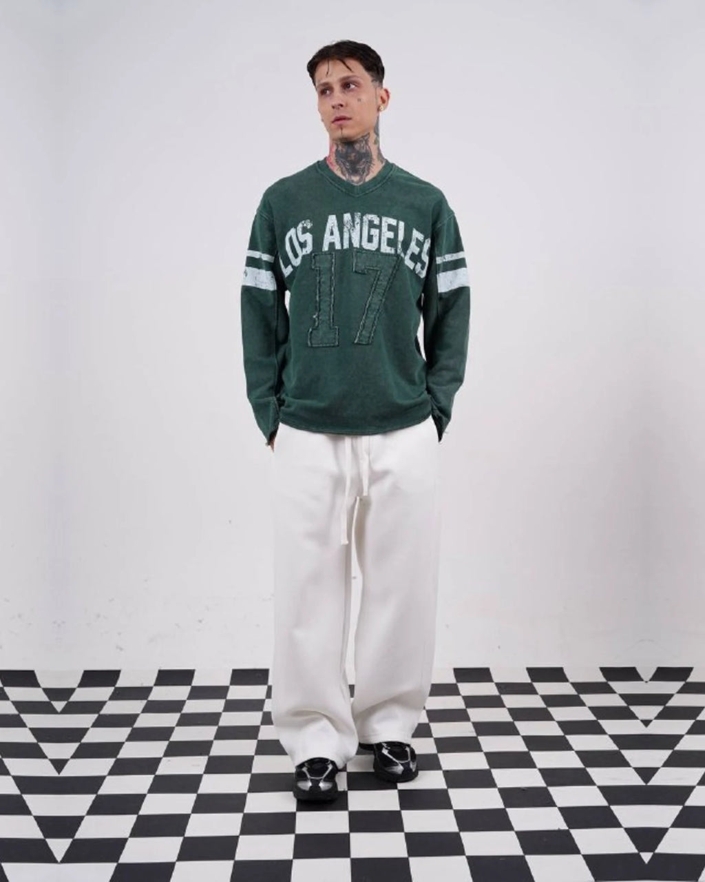 Los Angeles 17 oversized vintage football jersey sweatshirt in forest green, full-length front view, hands in pockets