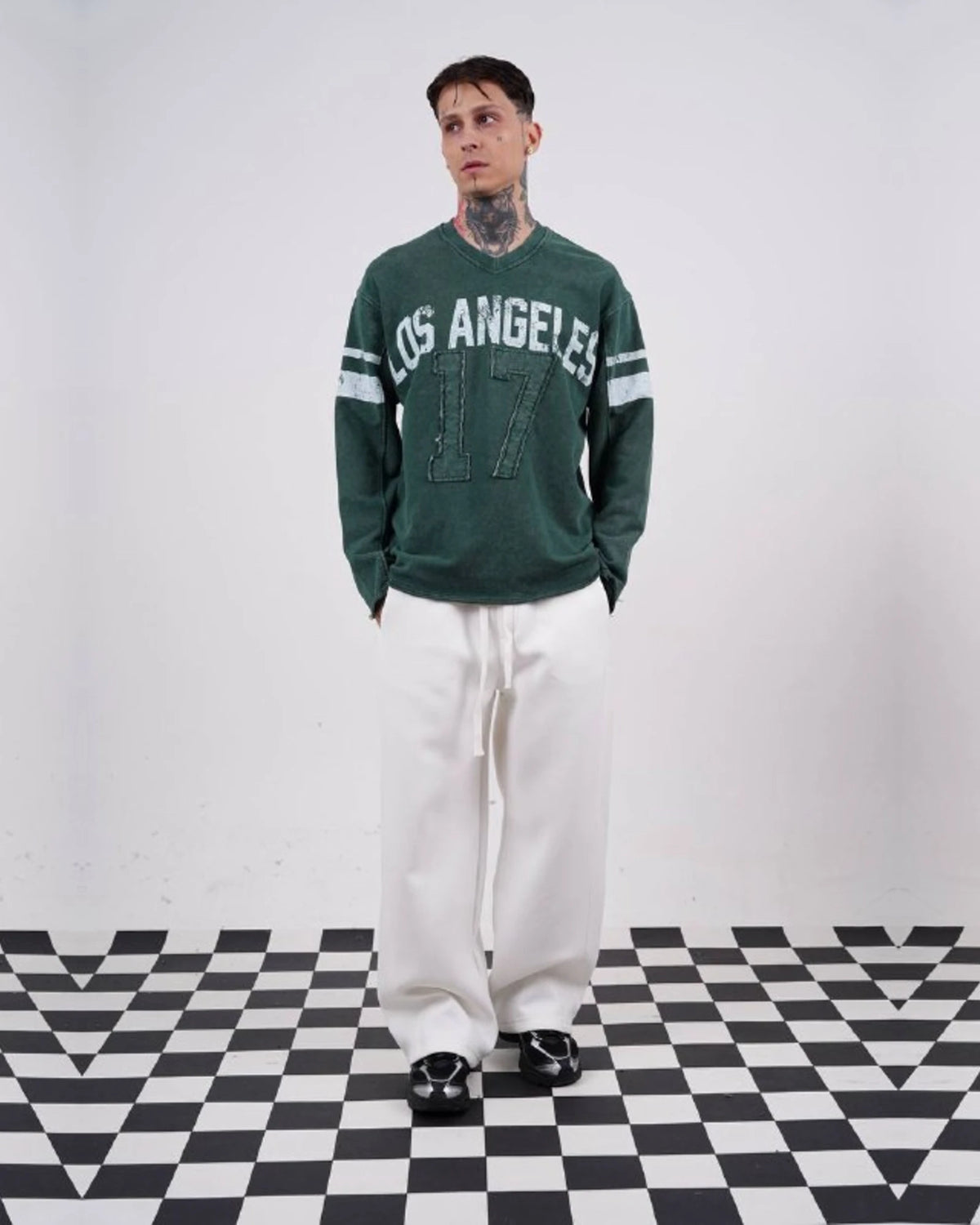 Los Angeles 17 oversized vintage football jersey sweatshirt in forest green, full-length front view, hands in pockets