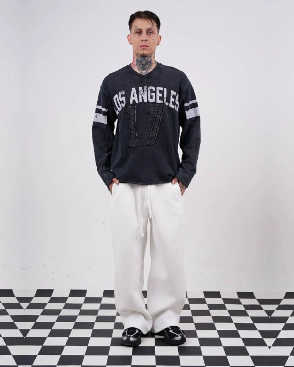 Los Angeles 17 oversized vintage football jersey sweatshirt in washed black, full-length front view, hands in pockets