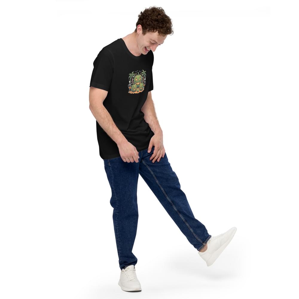 Black men's t-shirt with a graphic of three green watermelon jack-o'-lanterns and palm trees, worn by a model in a pose with one leg up on a white background.