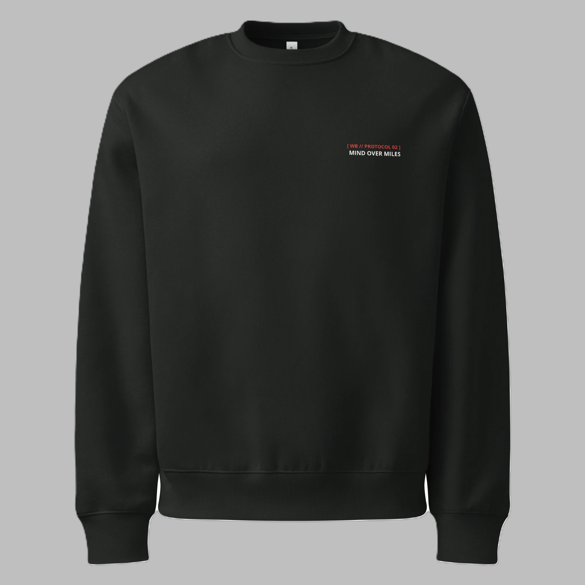 Front flat lay view of a black crewneck sweatshirt against a grey background, featuring minimalist text on the left chest with '[ WB // PROTOCOL 02 ]' in red and 'MIND OVER MILES' in white.