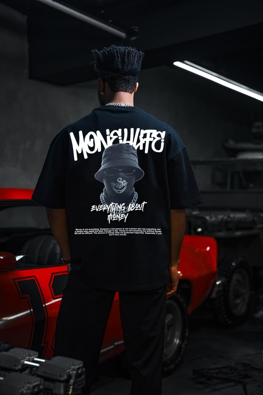 Everything About Money Urban Graphic Tee – Bold Typography Streetwear for the Hustle.