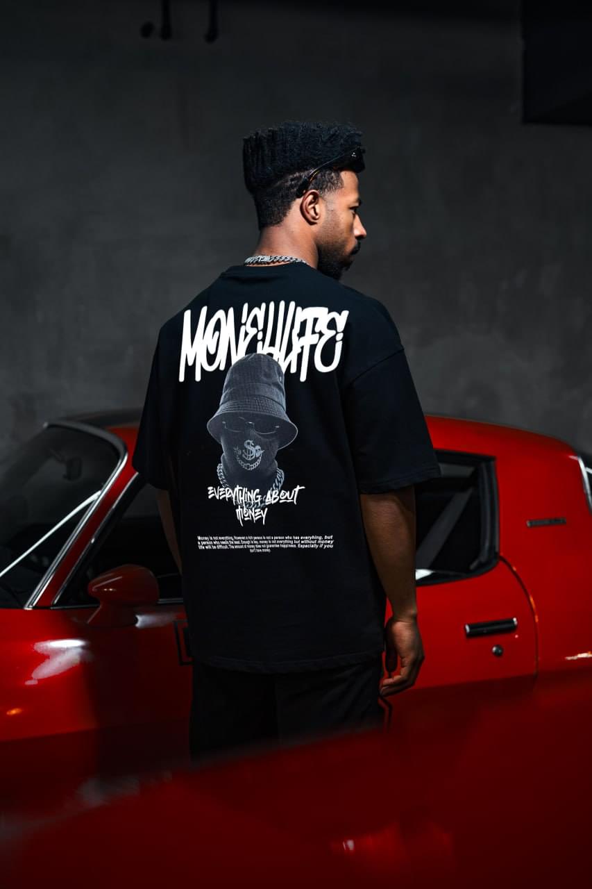 Everything About Money Urban Graphic Tee – Bold Typography Streetwear for the Hustle.