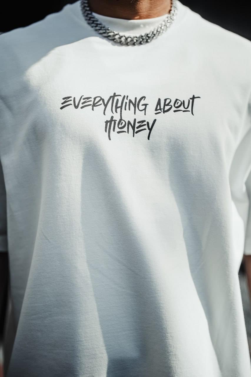 Everything About Money Urban Graphic Tee – Bold Typography Streetwear for the Hustle.