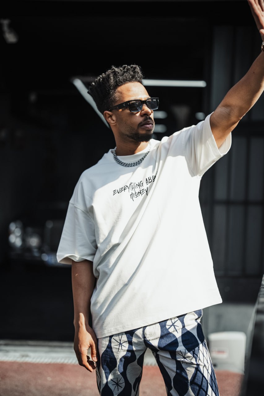 Everything About Money Urban Graphic Tee – Bold Typography Streetwear for the Hustle