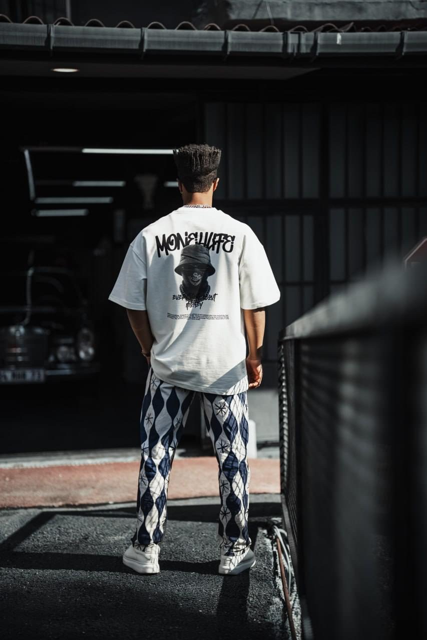 Everything About Money Urban Graphic Tee – Bold Typography Streetwear for the Hustle.