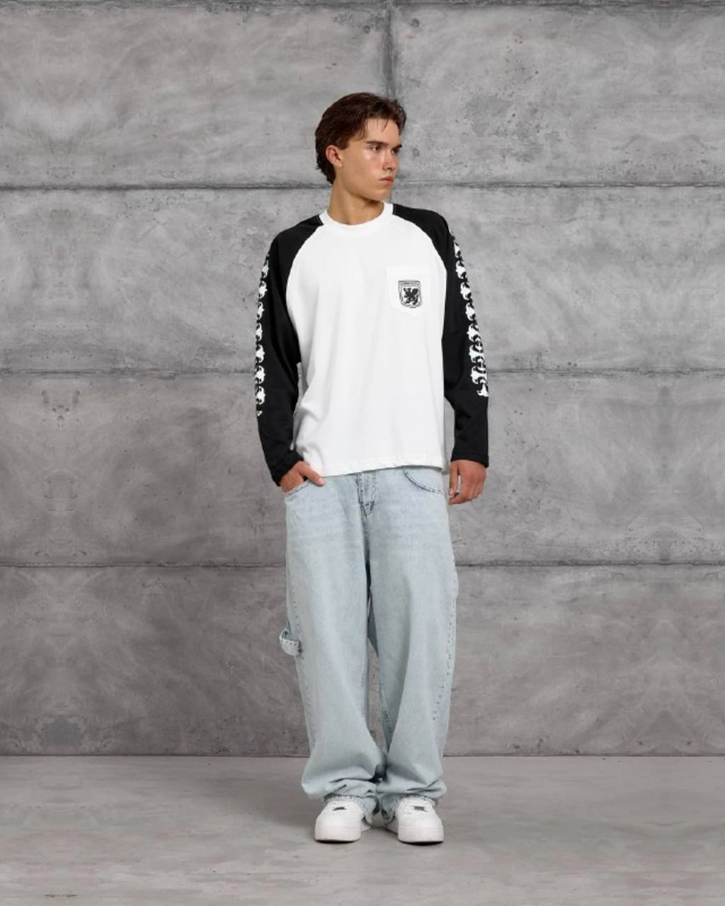 Gothic Sleeve Crest Pocket Raglan Sweatshirt in Black by Withinblack - view 2