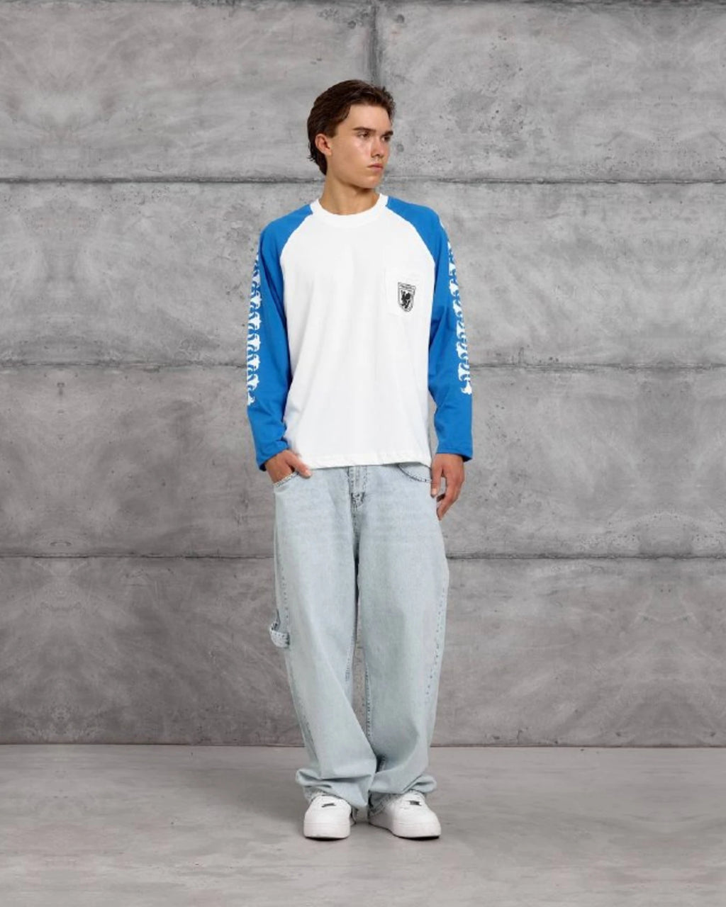 Gothic Sleeve Crest Pocket Raglan Sweatshirt in Royal Blue by Withinblack - view 3