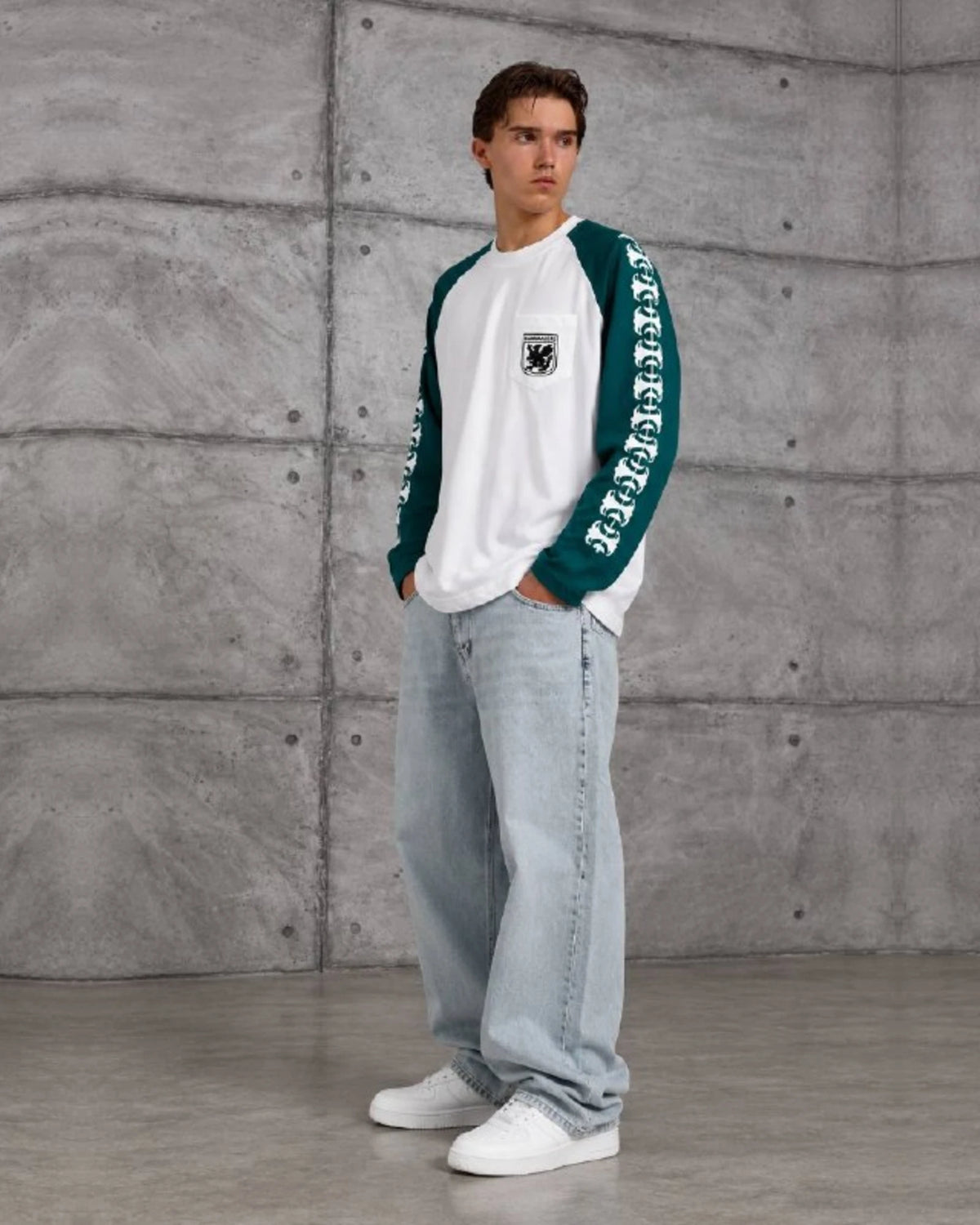 Gothic Sleeve Crest Pocket Raglan Sweatshirt in Green by Withinblack