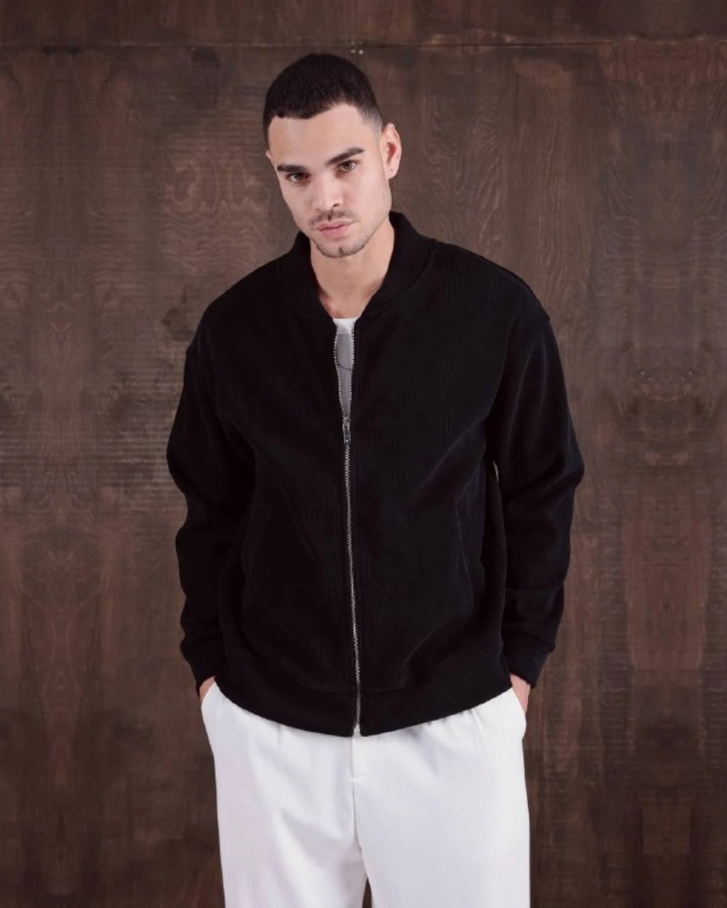 Oversized Laminated Chenille Varsity Jacket in black, photo 1