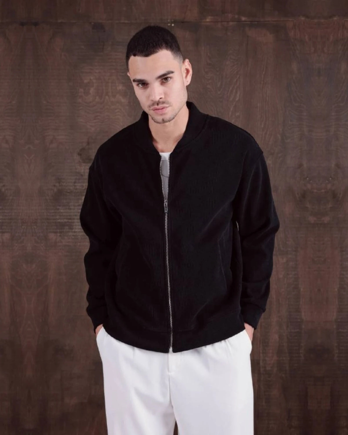 Oversized Laminated Chenille Varsity Jacket in black, photo 1