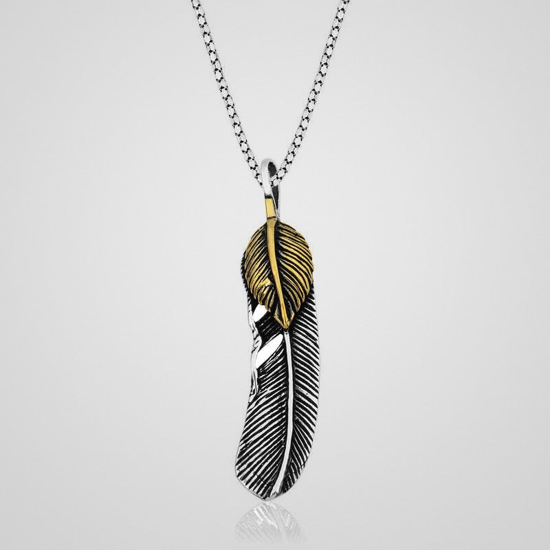 Men's oxidized 925 sterling silver feather pendant with gold-tone tip