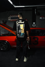 Mischief Icon Men's Graphic Tee – Tattooed Character Streetwear with Attitude