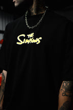 Mischief Icon Men's Graphic Tee – Tattooed Character Streetwear with Attitude