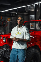 Mischief Icon Men's Graphic Tee – Tattooed Character Streetwear with Attitude