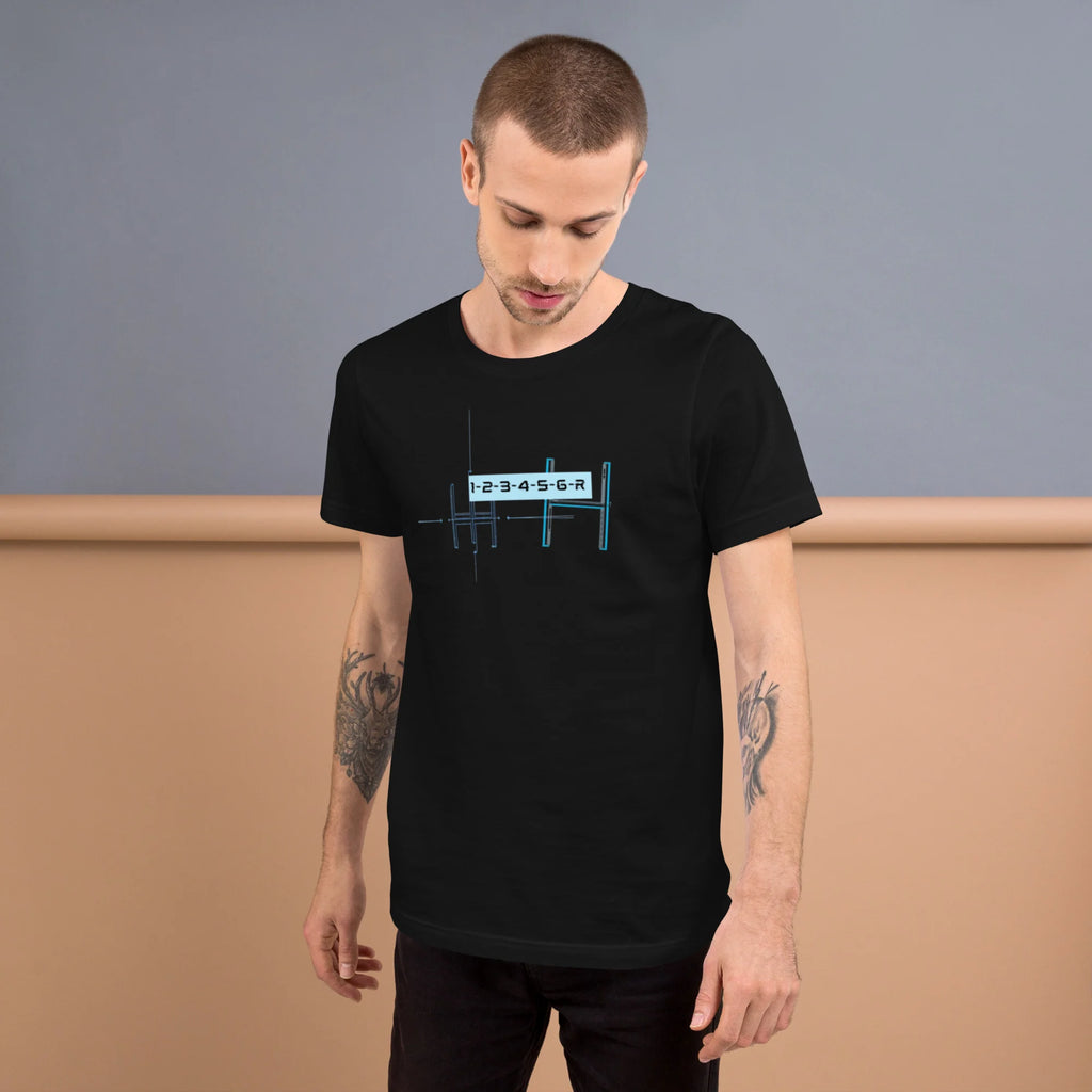Tattooed male model wearing a vintage black 6-speed manual transmission blueprint stick shift car enthusiast graphic t-shirt