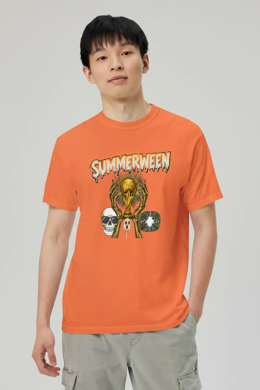 Male model wearing a burnt orange heavyweight t-shirt with a Summerween skeleton and golden trophy graphic