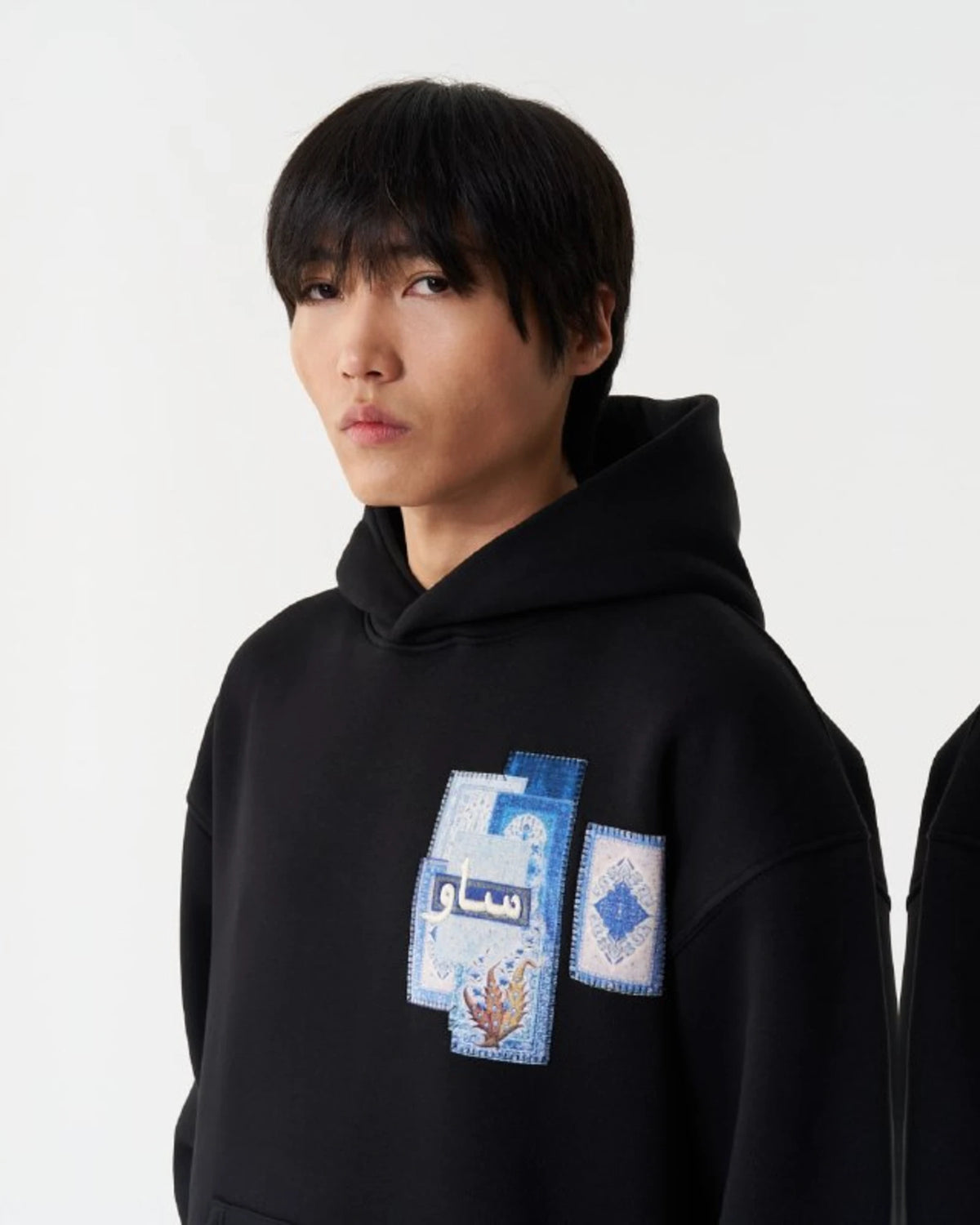Blue Rug Patchwork Arabic Script Oversized Hoodie in Black - detail