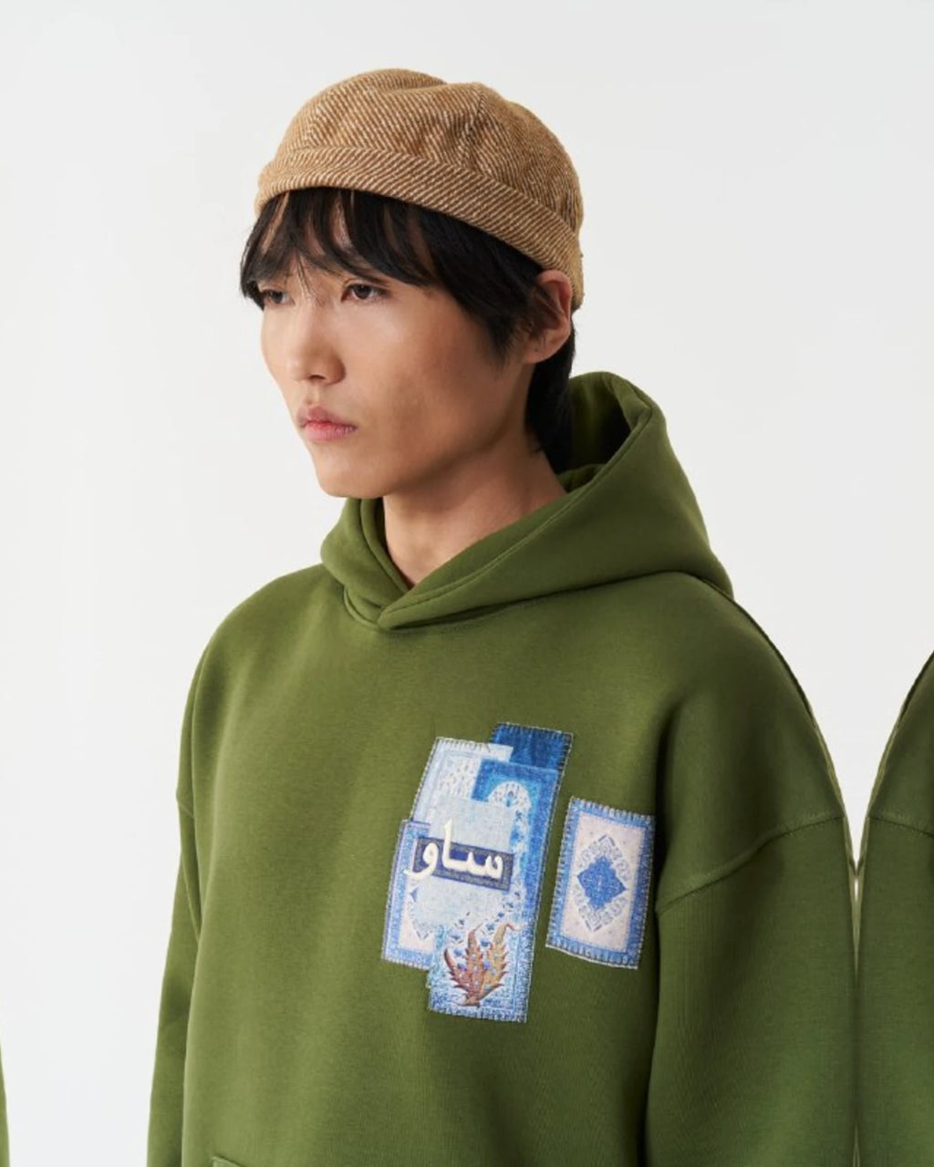 Blue Rug Patchwork Arabic Script Oversized Hoodie in Green - detail