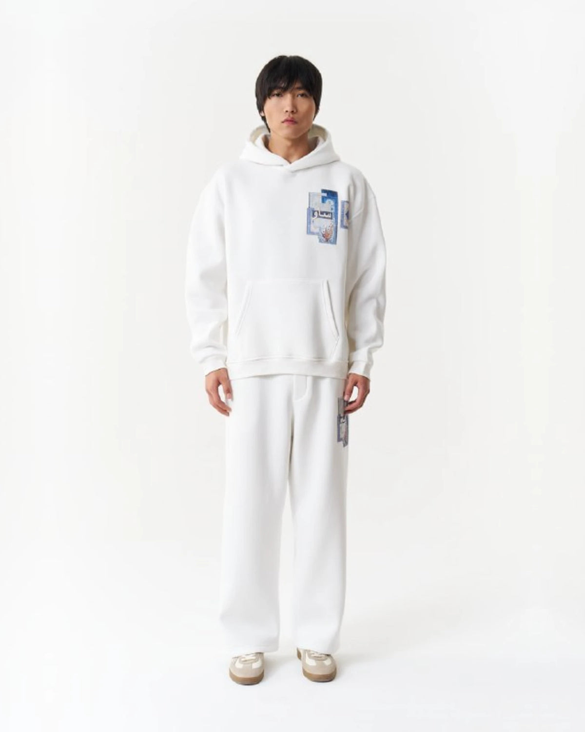 Blue Rug Patchwork Arabic Script Oversized Hoodie in White - front view