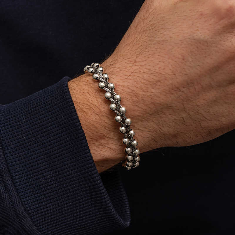 Oxidized 925 silver ball bead bracelet for men, close-up on wrist