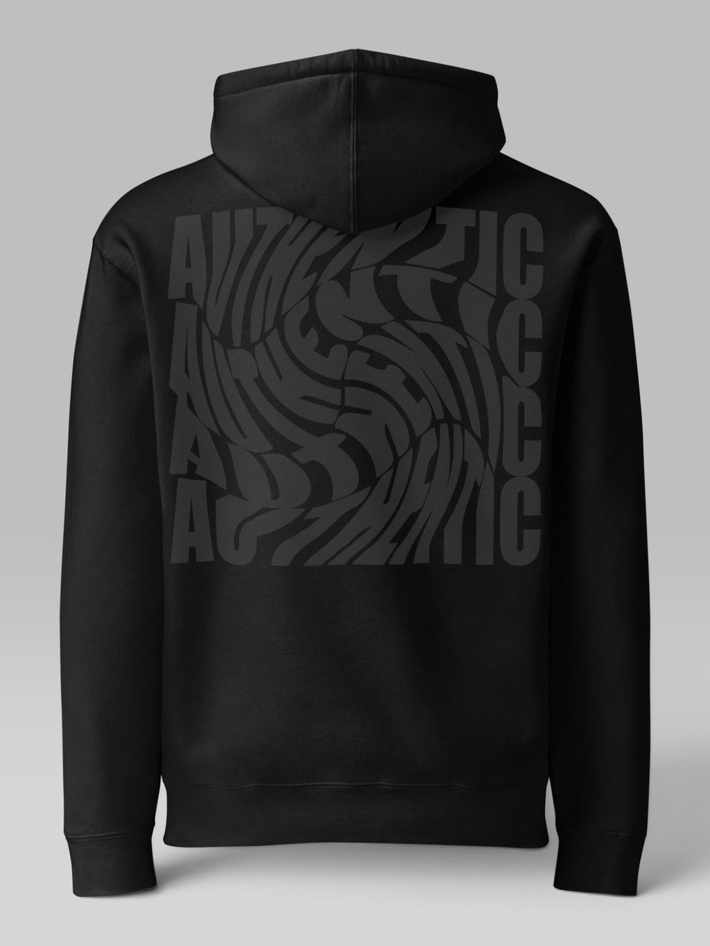 Back view of a black oversized streetwear hoodie with grey wavy text print
