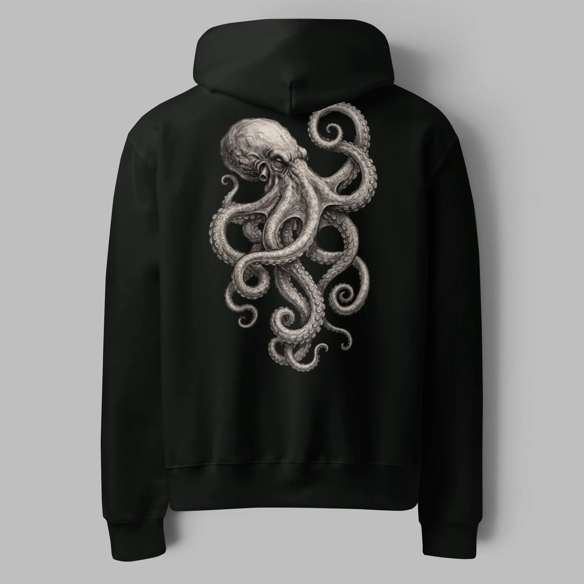 Flat lay back view of a black oversized pullover hoodie featuring an illustrated kraken octopus art print