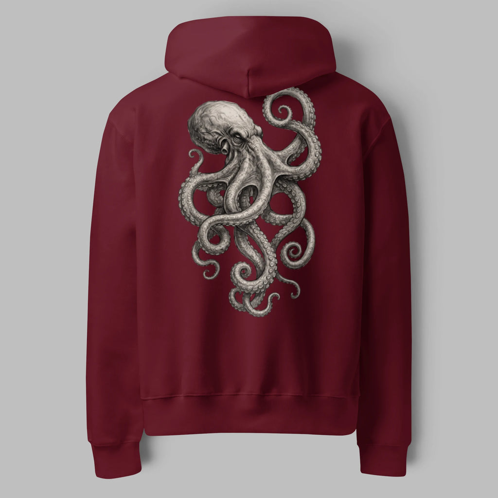 Flat lay rear view of an oversized burgundy maroon pullover hoodie featuring an illustrated kraken octopus graphic on the back