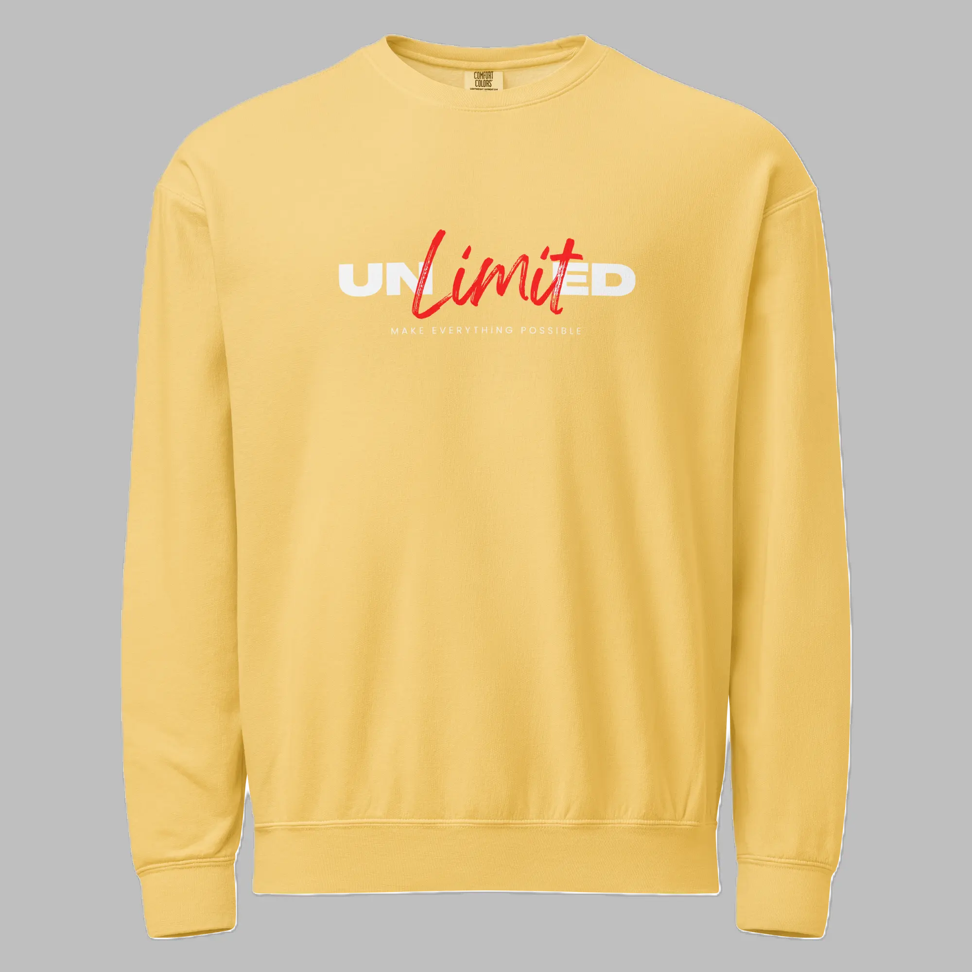 Front view of a pastel yellow crewneck sweatshirt featuring 'UNLIMITED' printed across the chest in white bold letters with 'Limit' overlaid in red script, above the small text 'MAKE EVERYTHING POSSIBLE'.