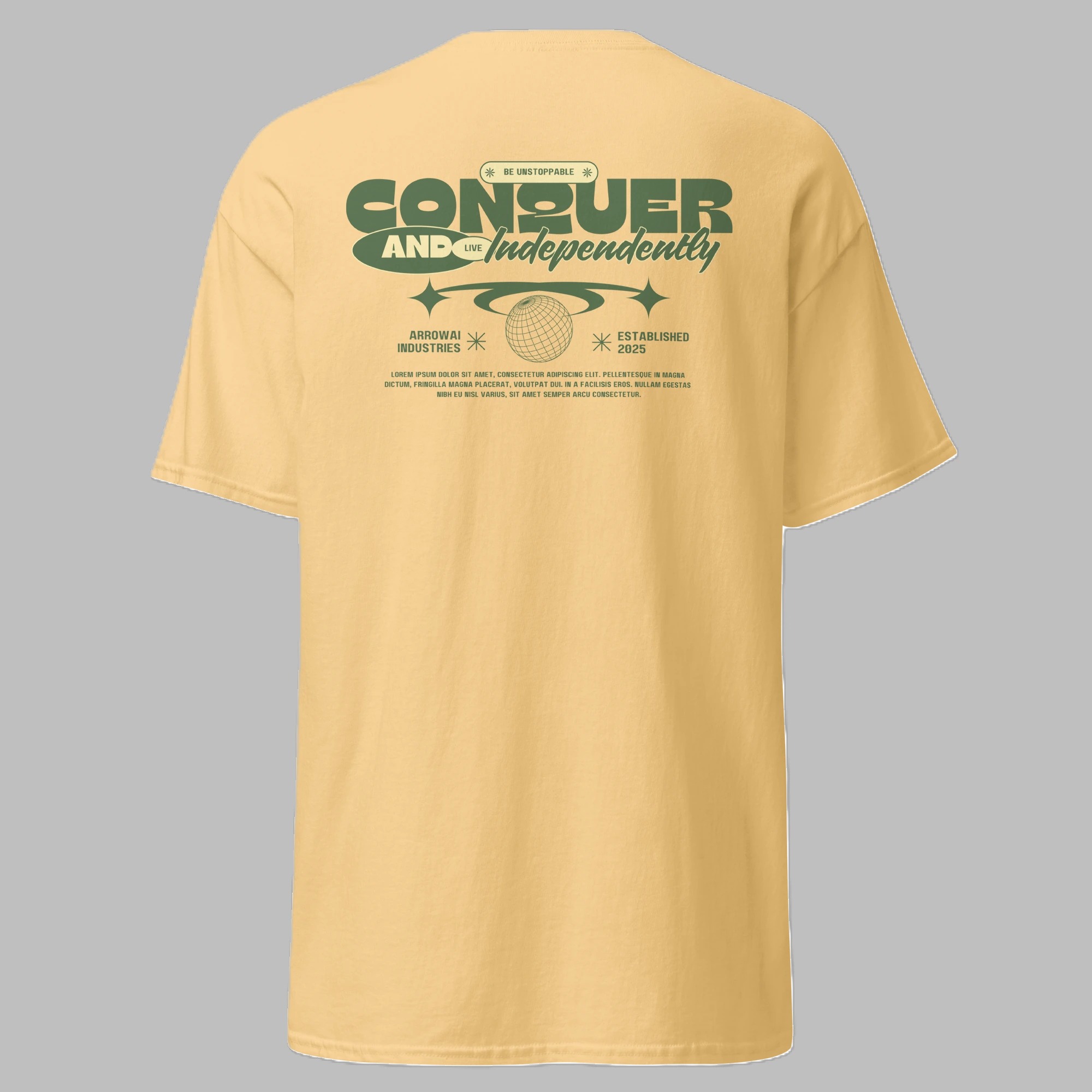 Back view of a pastel yellow graphic t-shirt featuring a vintage green Conquer and Live Independently print.