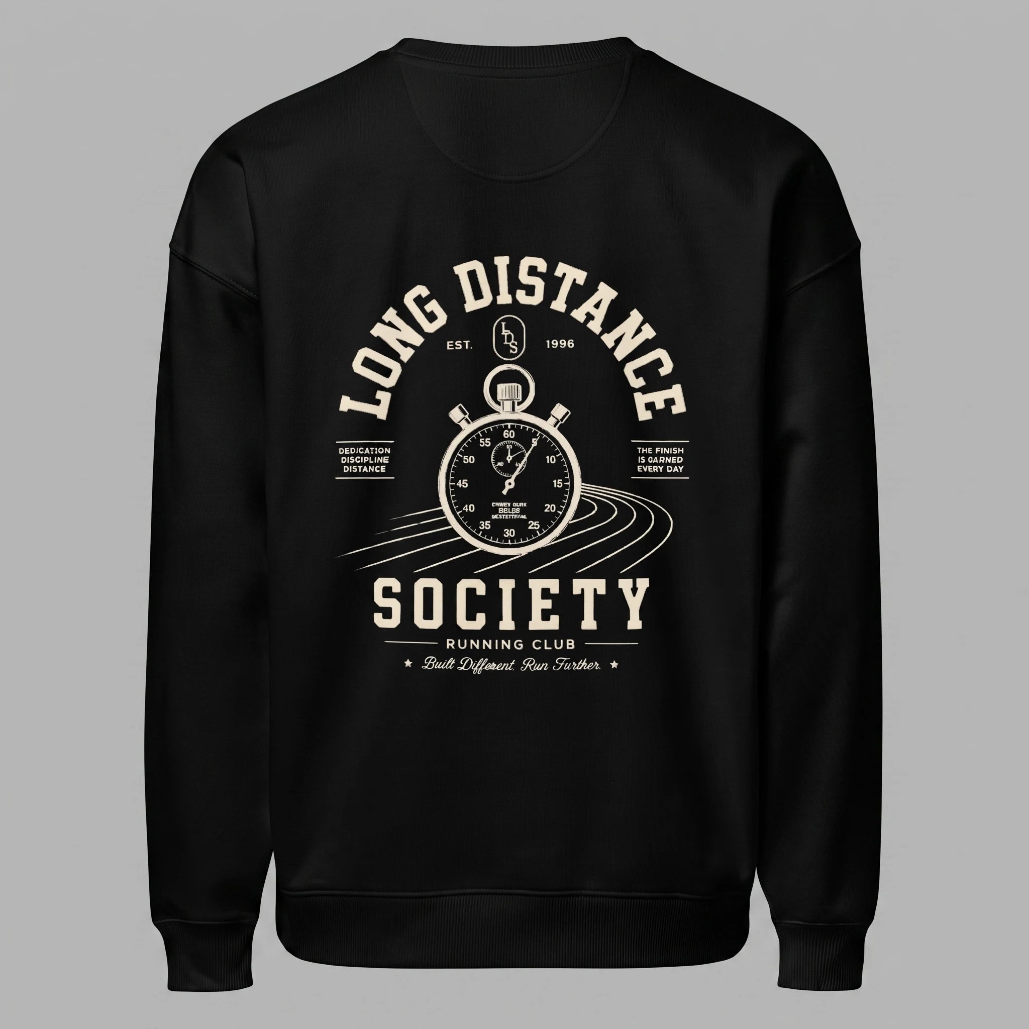 Back view of a black crewneck sweatshirt displayed flat against a grey background, featuring an off-white graphic of a vintage stopwatch over running track lanes, with text reading 'LONG DISTANCE SOCIETY RUNNING CLUB' and 'Built Different Run Farther'.