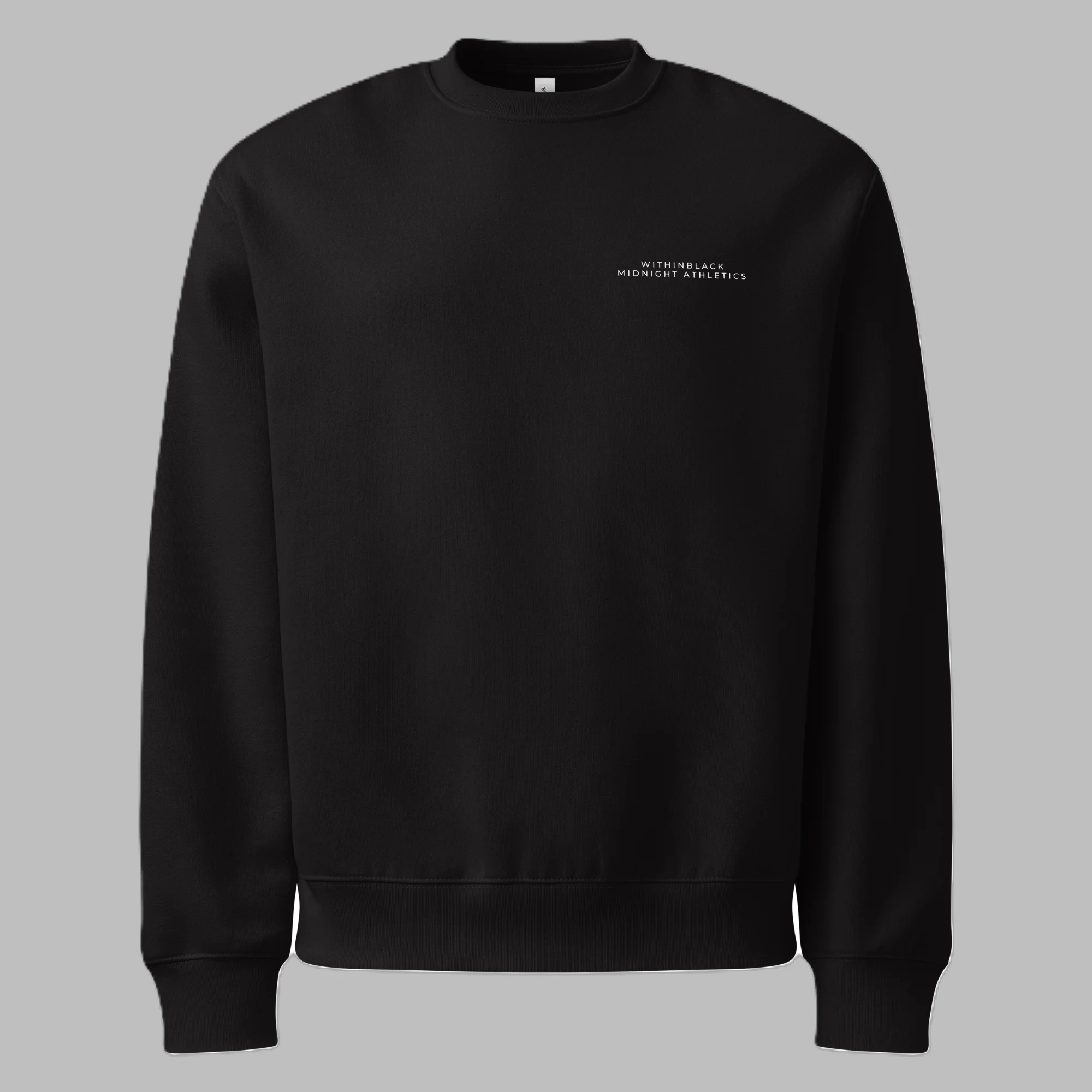 Front flat lay view of a solid black crewneck sweatshirt against a grey background, featuring minimalist white text on the left chest reading 'WITHINBLACK MIDNIGHT ATHLETICS'.